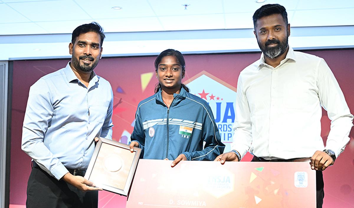 A young cricketer honoured at the ceremony