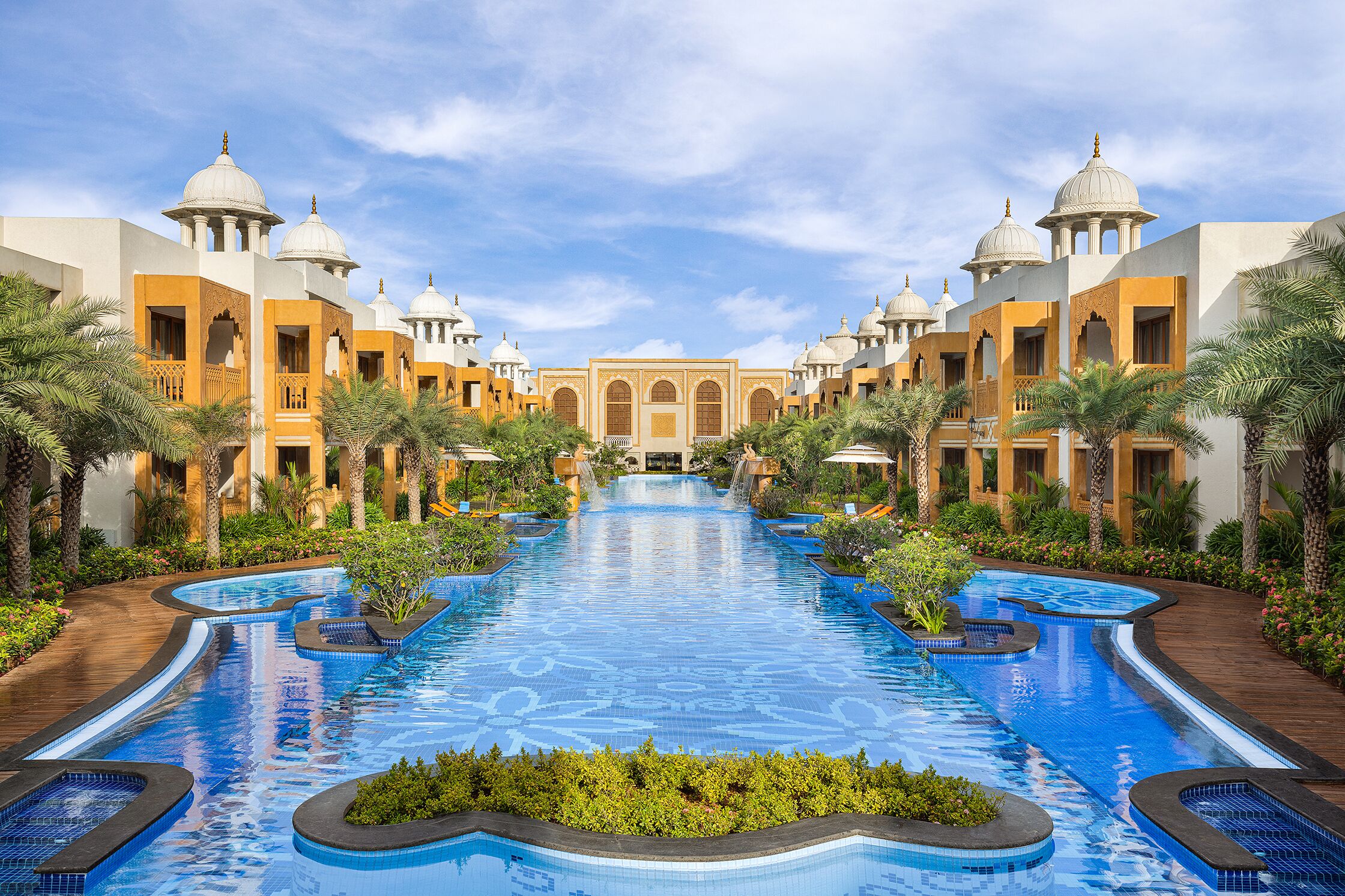 Palatial architecture around a resort pool