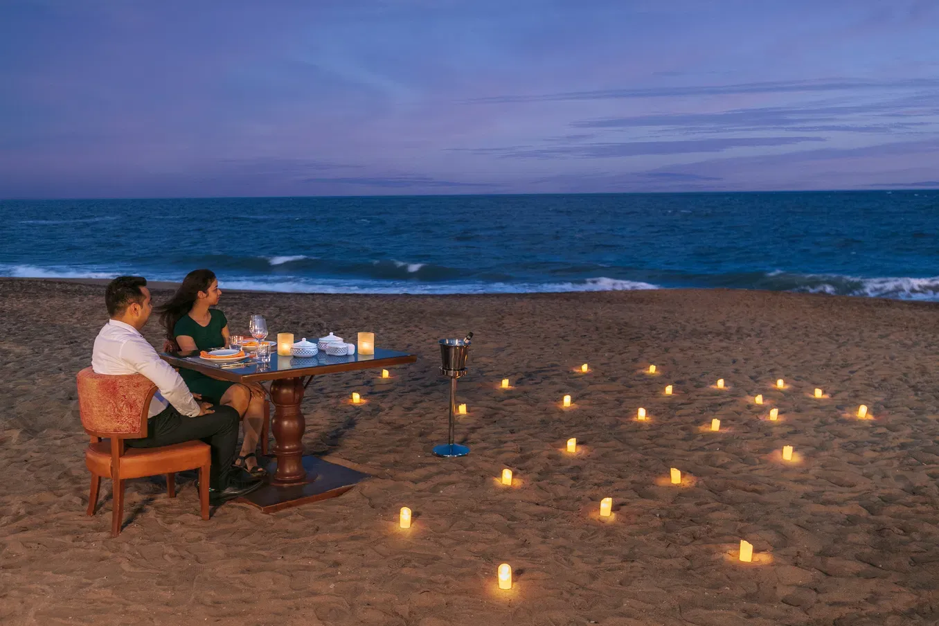 A candlelit dinner on a private beach