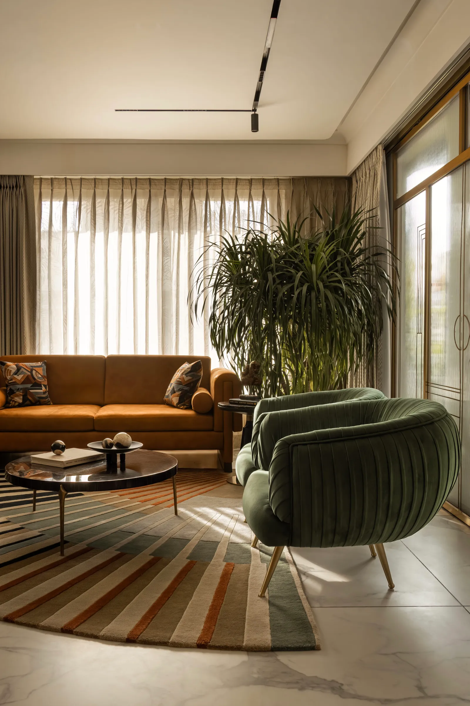 Warm tans and jewel greens in the living room