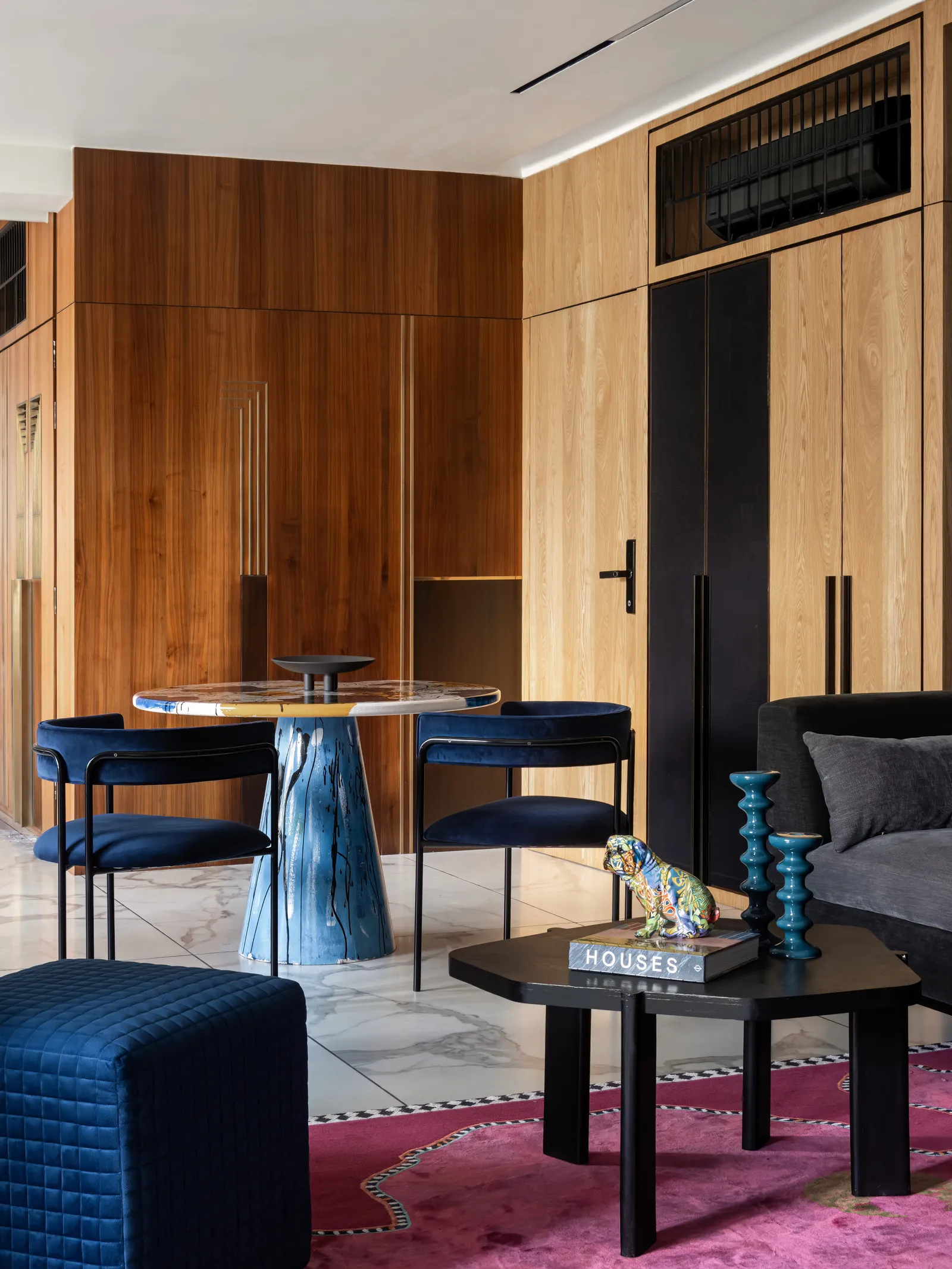 An intimate dining nook layered in colour
