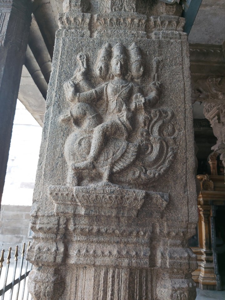 Stone pillars carved with divine figures