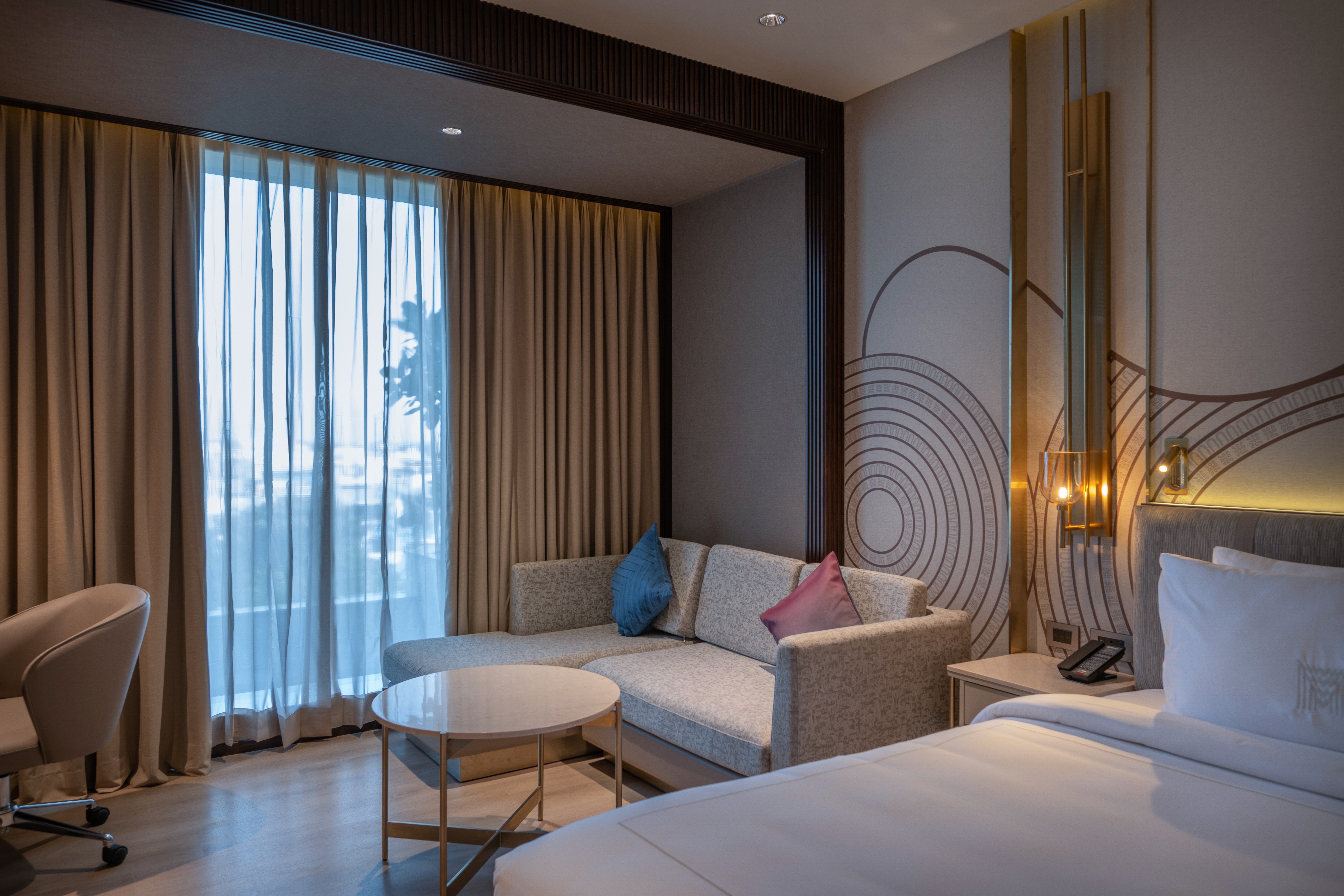 A contemporary guest room blending comfort and craft