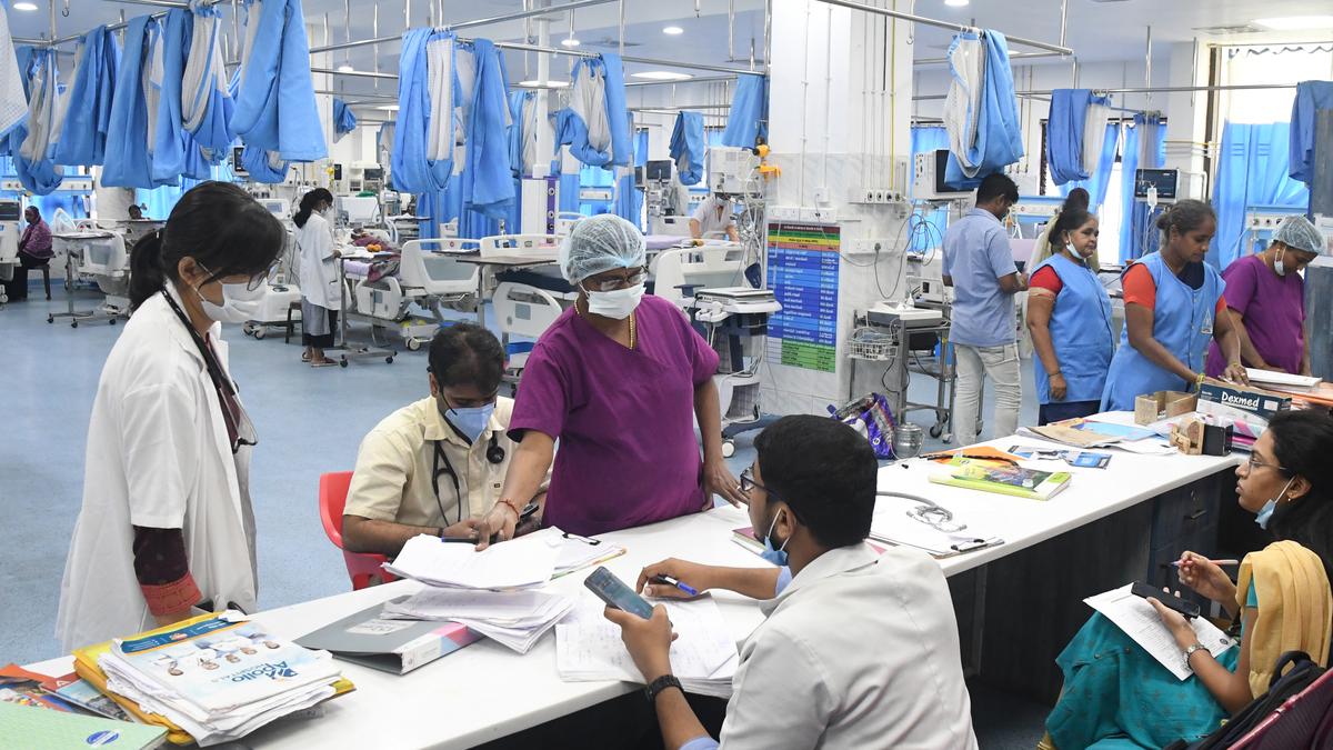 Doctors and staff at a patient consultation