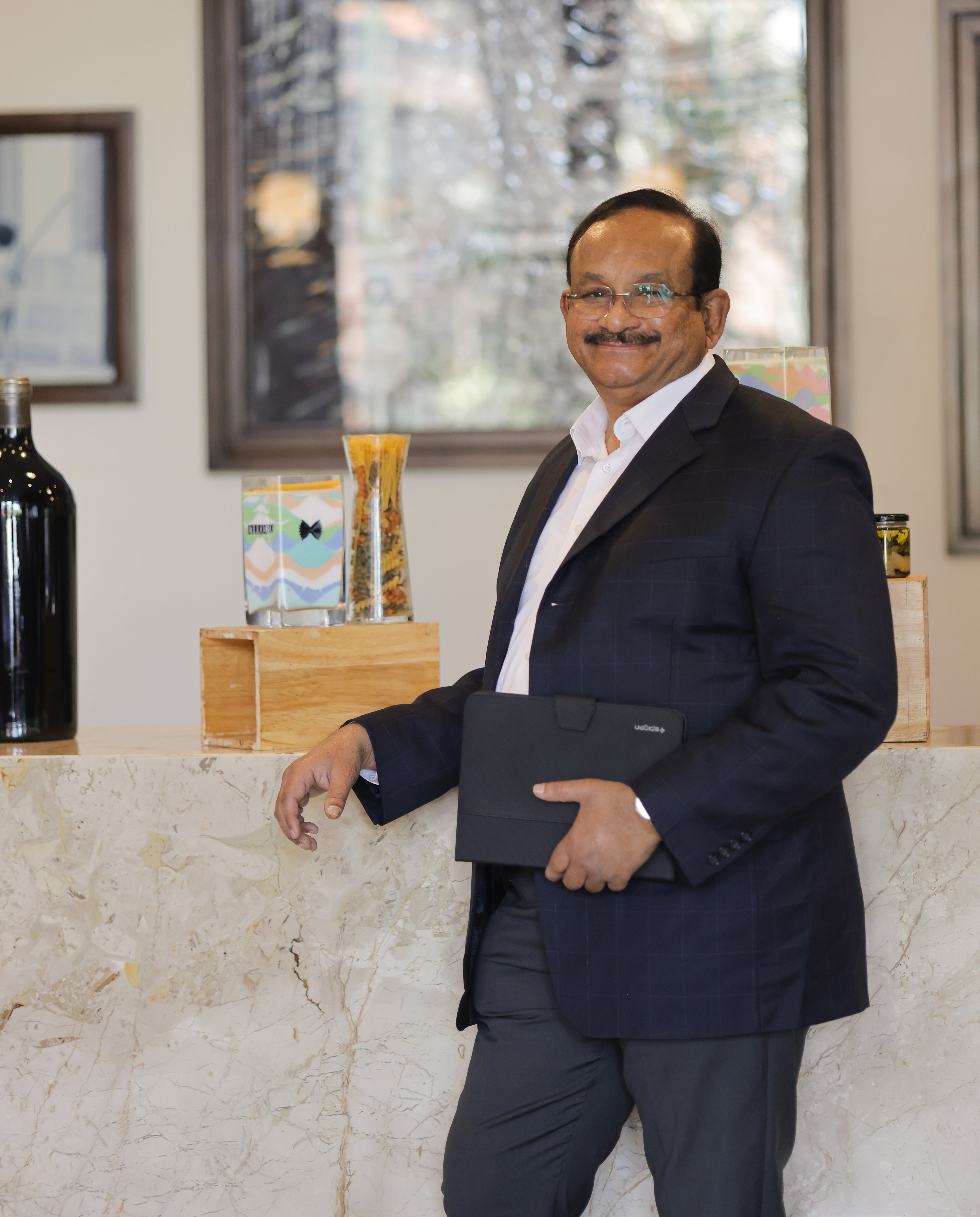 Dr. Madeswaran receiving an international award on stage