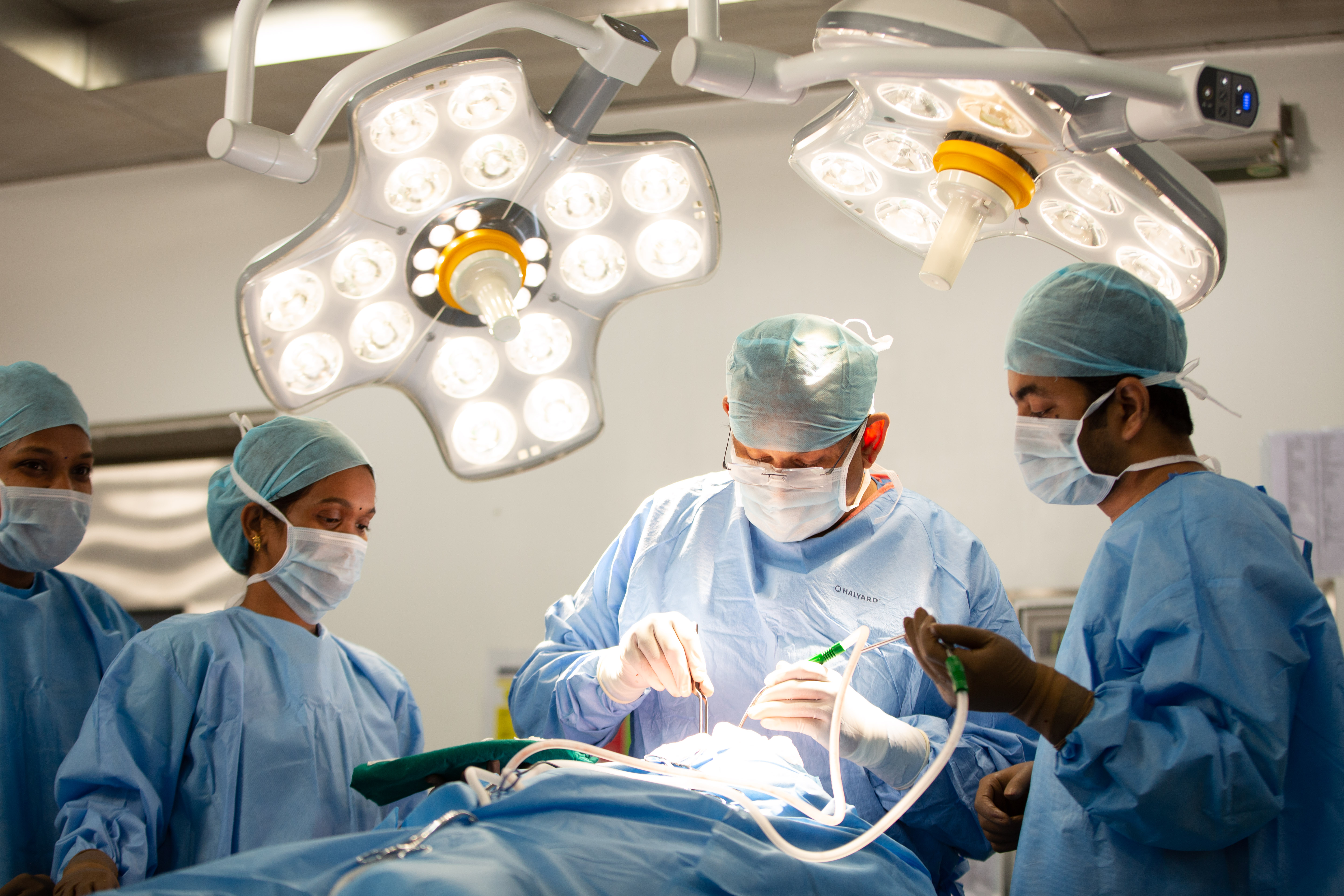 Surgical team performing a transplant procedure at RoyalCare Hospital