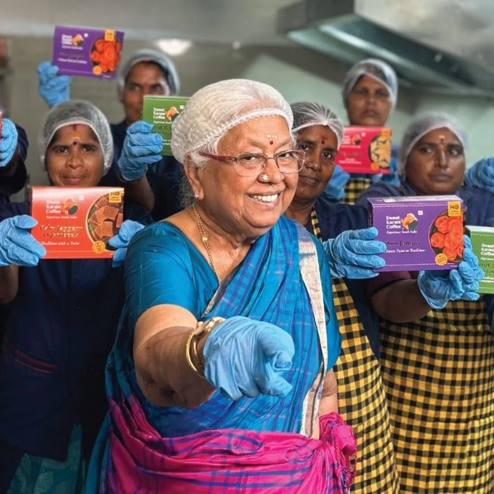 Sweet Karam Coffee family portrait with Janaki Paati and the founding team