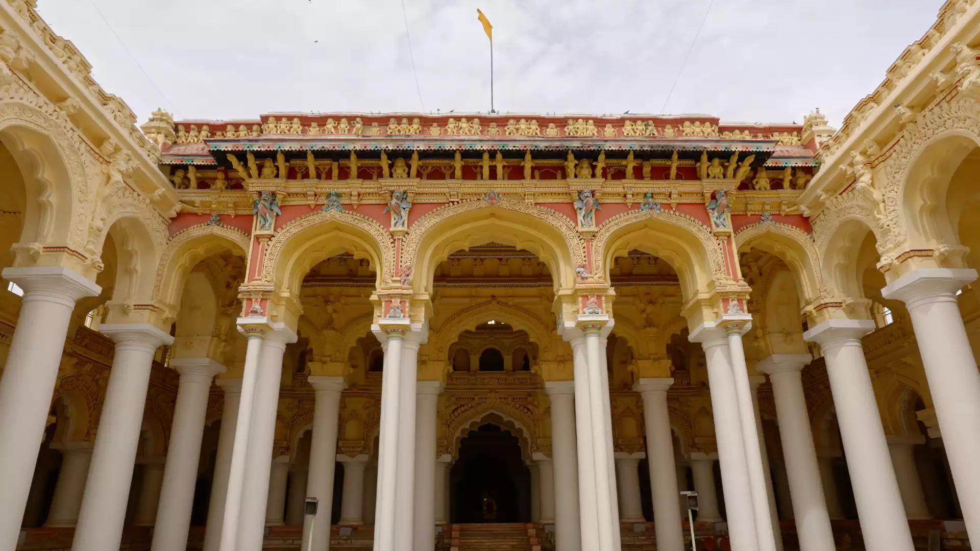 The palace facade, ringed by its famous columns