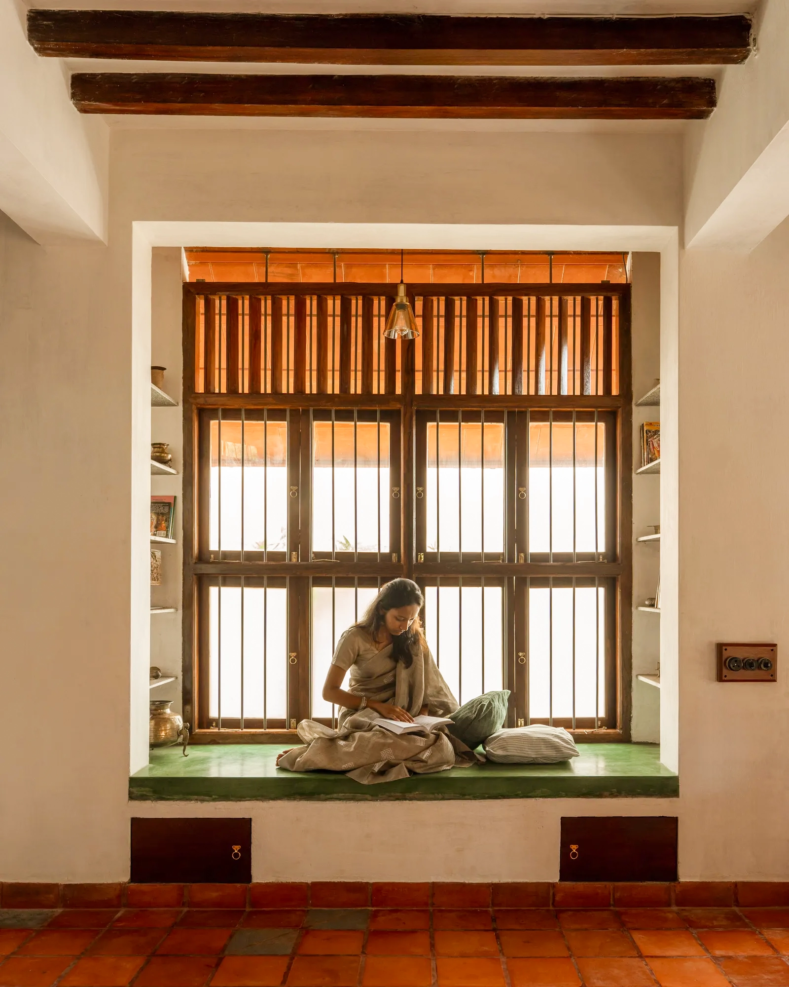A timber-framed window reading nook